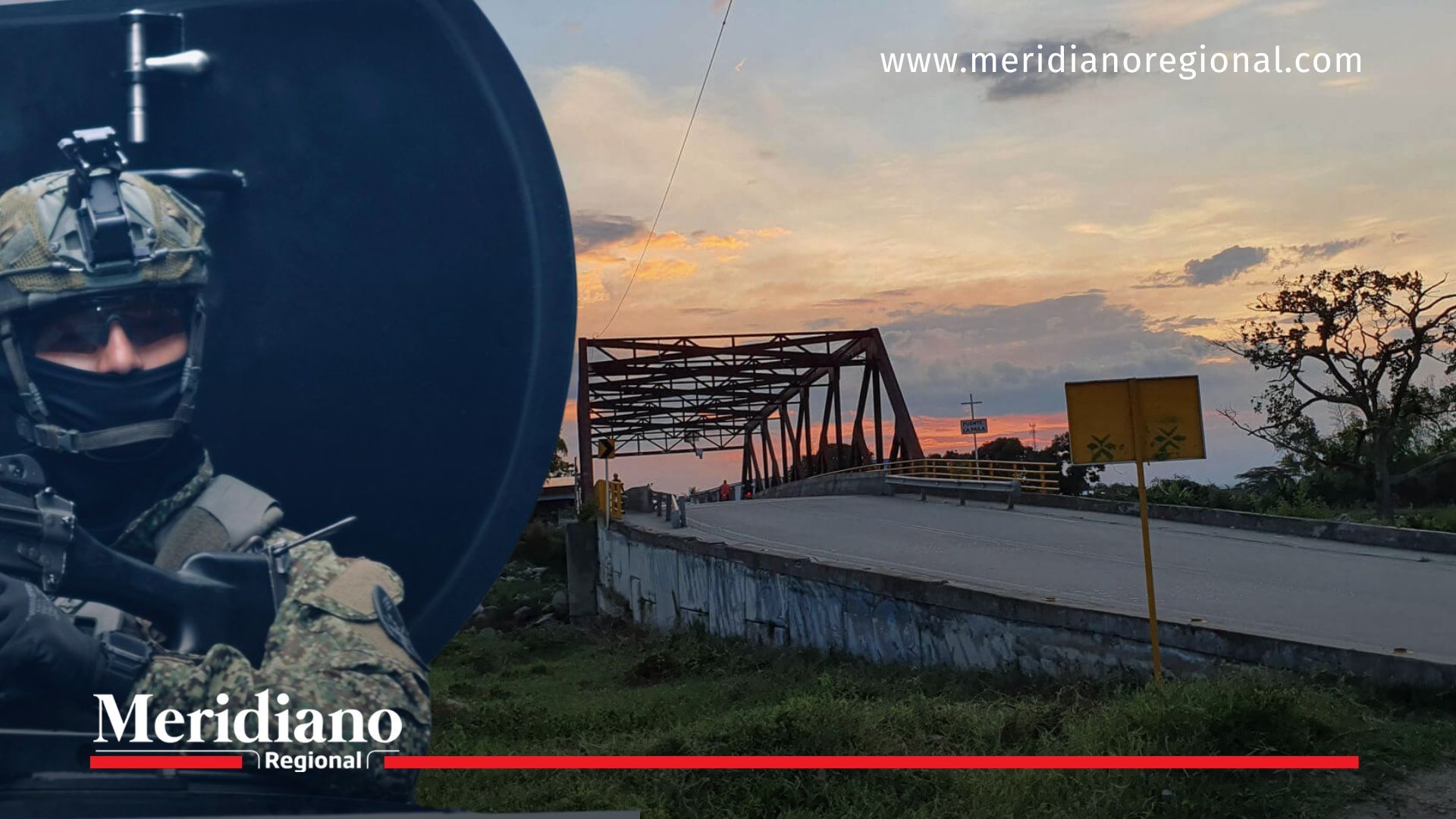 Soldado armado vigila camino en Corinto, Cauca, en medio del confinamiento por combates.