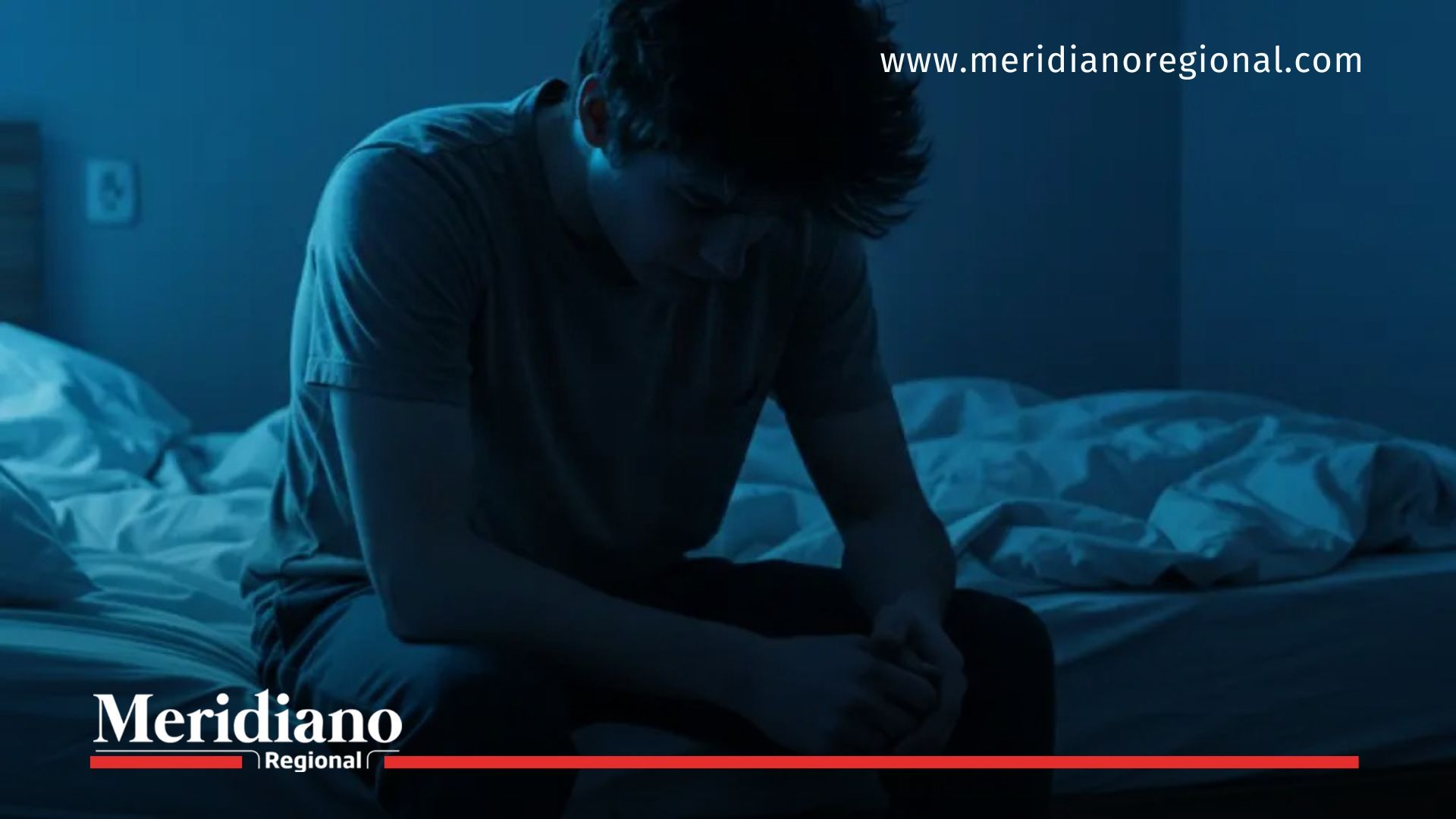 joven triste en la cama por problemas de salud mental