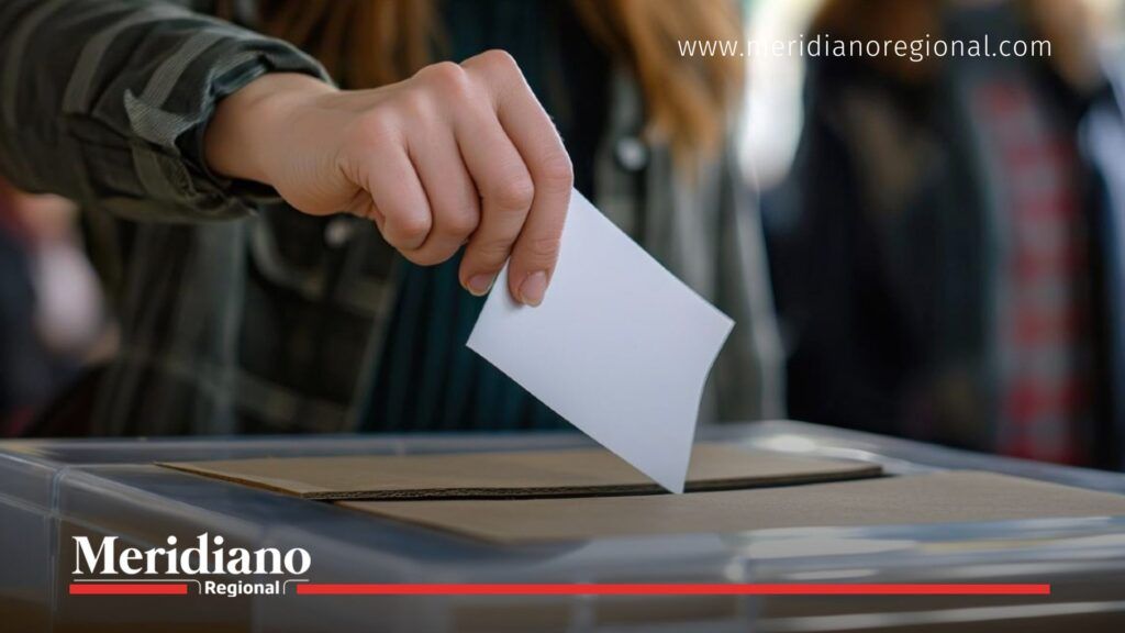 Ciudadano deposita su voto en urna durante la seguridad consulta Pacto Histórico Cauca, jornada democrática que busca participación libre y transparente.