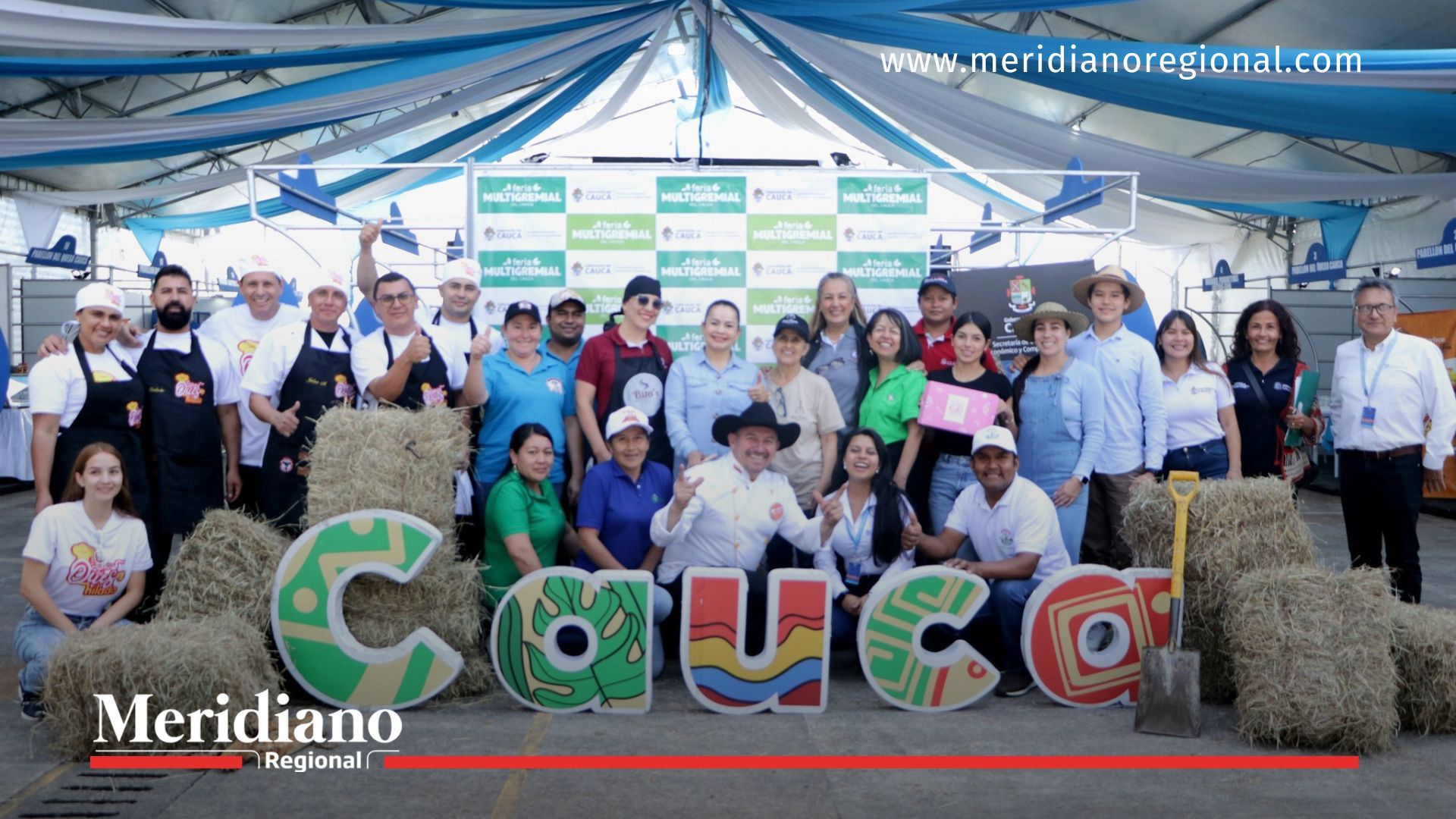Grupo de expositores y asistentes posa durante la Feria Multigremial 2025 en Popayán.