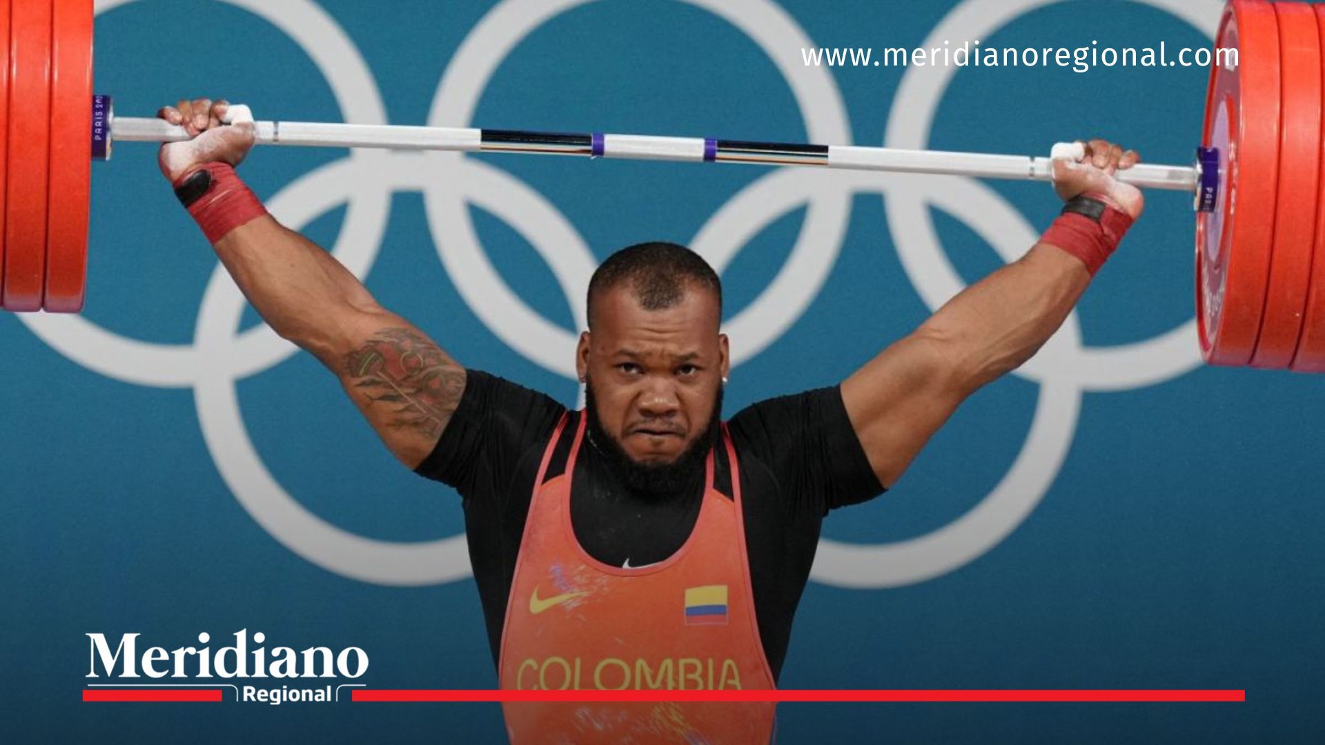 Jeison López compitiendo en levantamiento de pesas en los Juegos Olímpicos