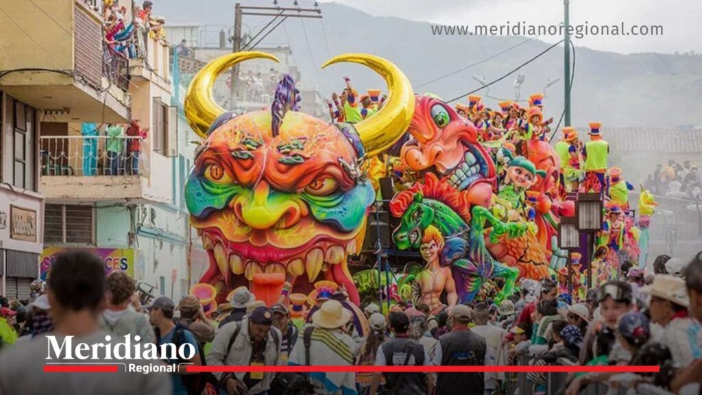 Talco carnavalero en Pasto: colorido desfile del Carnaval 2026 - Meridiano Regional Carroza gigante y colorida del Carnaval de Negros y Blancos en Pasto, con asistentes en las calles durante un desfile tradicional afectado por la prohibición del talco carnavalero en 2026.