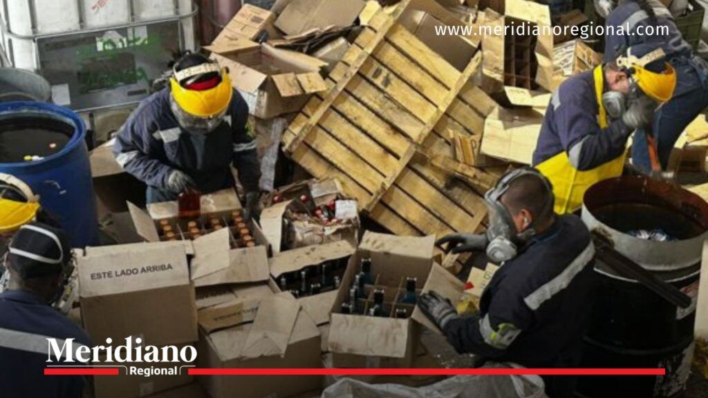 destrucción de licores y cigarrillos en el Valle del Cauca con apertura de cajas de licor ilegal en Yumbo