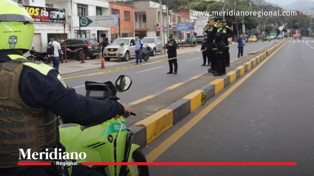 policía en la escena del sicariato tras balacera en Cali