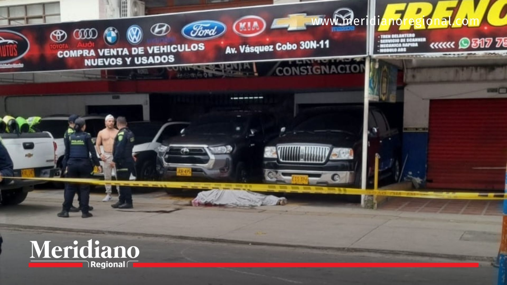 escena de la balacera en Cali en la Avenida Vásquez Cobo frente a un comercio