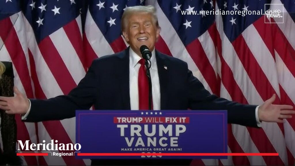 Donald Trump durante el discurso Estado de la Unión frente a banderas de Estados Unidos.