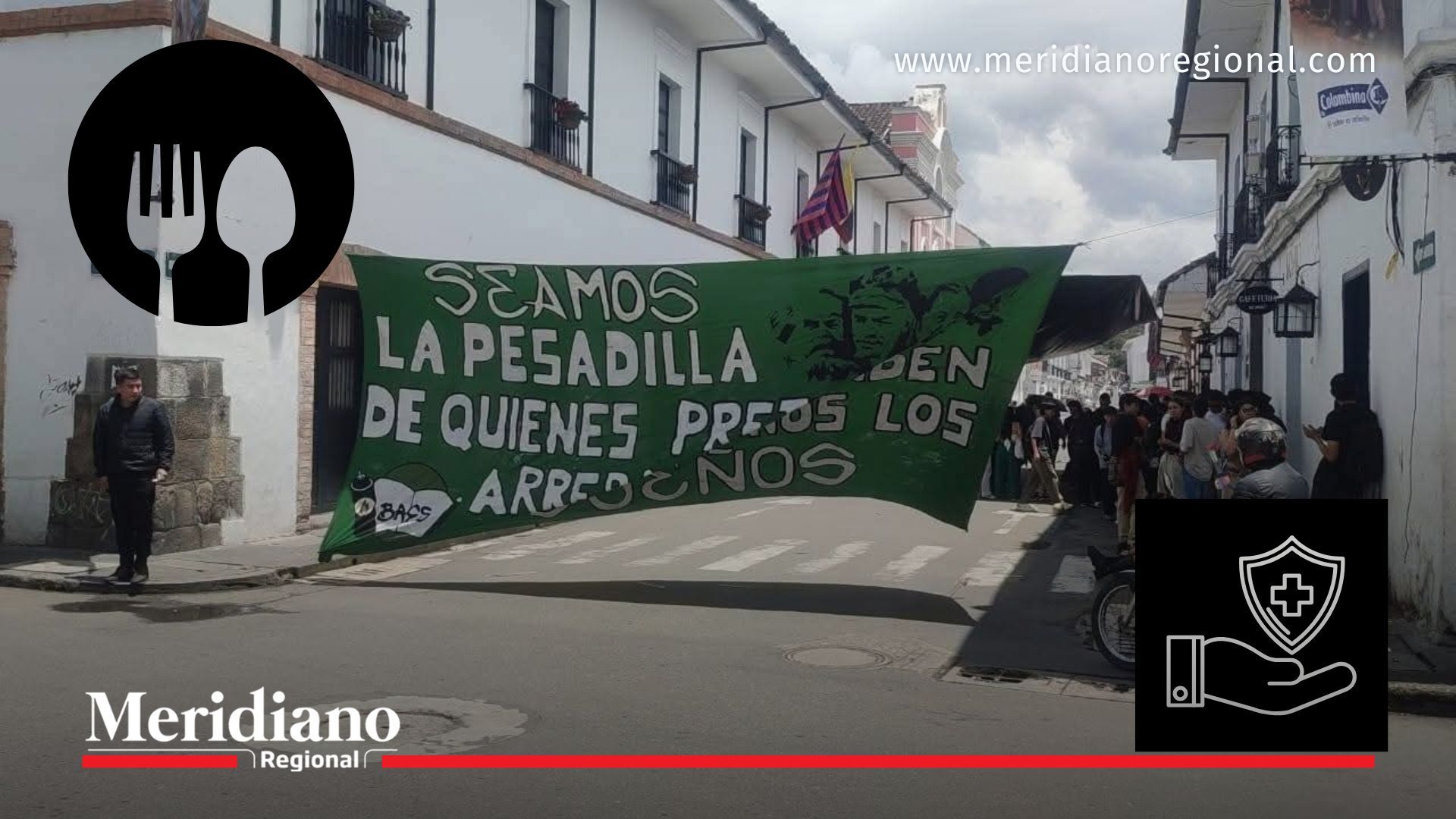 Protesta en la Universidad del Cauca frente a la rectoría en Popayán por aumento del seguro estudiantil y costos del almuerzo universitario.