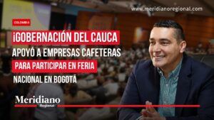 Gobernación del Cauca apoyó a empresas cafeteras en feria nacional de Bogotá. - Meridiano Regional News banner featuring a smiling man in a suit on the right, with bold Spanish headline about the Cauca government supporting coffee companies to attend a Bogotá fair; Meridiano Regional logo on the bottom left.