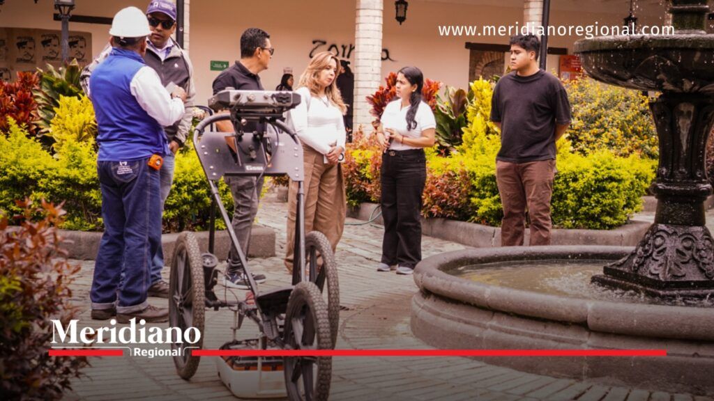 Grupo de personas junto a un georradar en el patio del Claustro de El Carmen de Popayán durante una investigación sobre posibles túneles subterráneos.