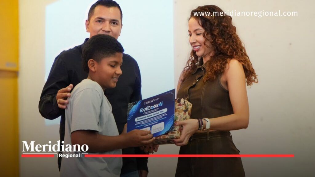 Niño recibe certificado de Exploradores IA durante la entrega de reconocimientos del programa de inteligencia artificial en el Cauca.